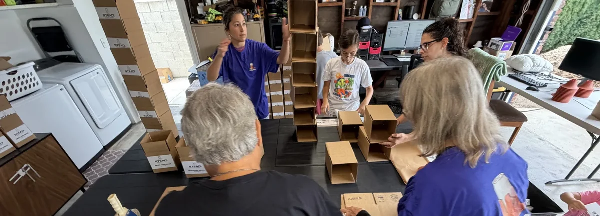 Steadi team packing products at the workshop
